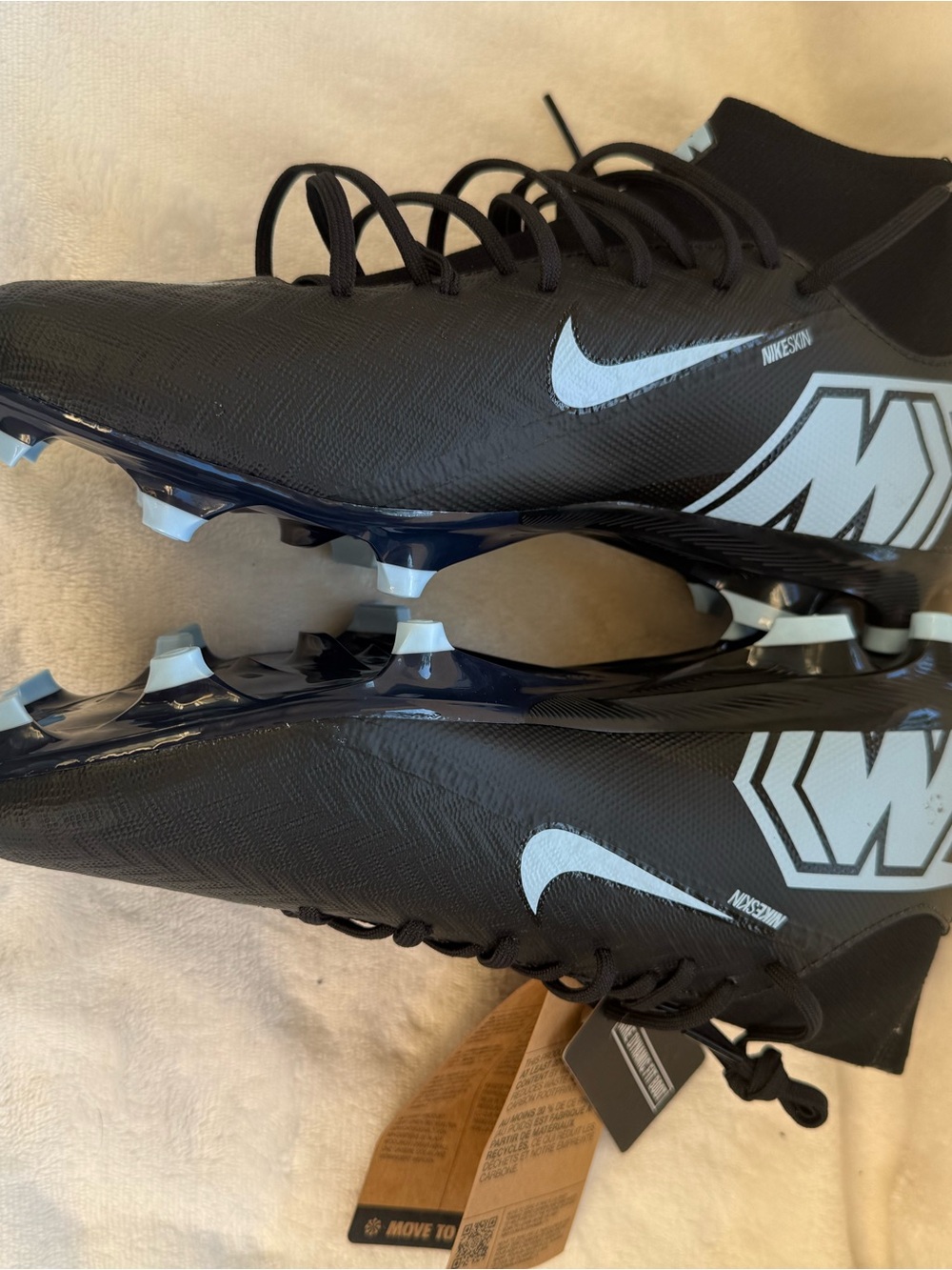 Nike Men’s Black Soccer Cleats with Light Blue Swoosh